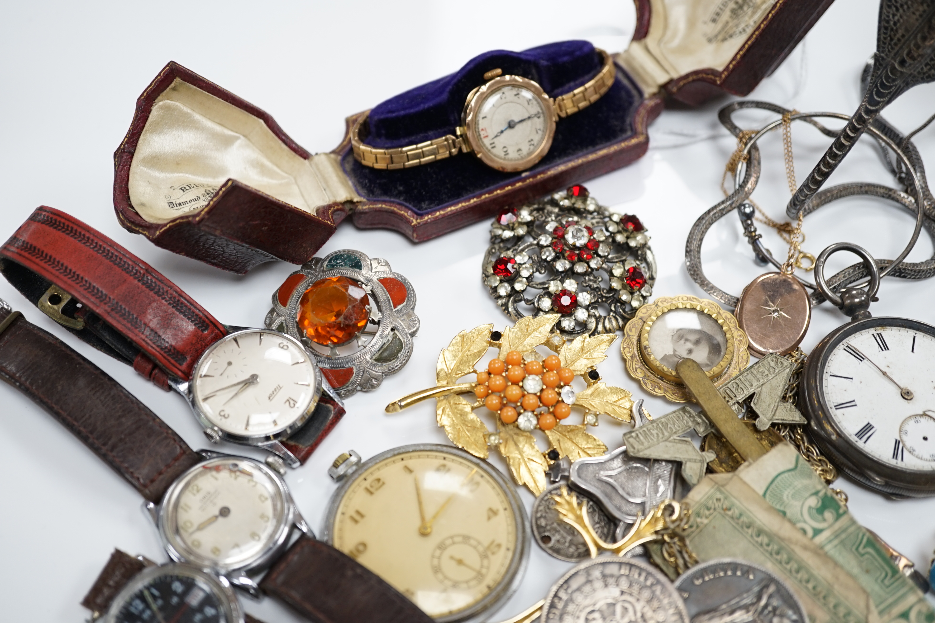 A quantity of assorted mainly costume and other jewellery and a lady's 9ct gold manual wind wrist watch, on a 9ct gold bracelet.